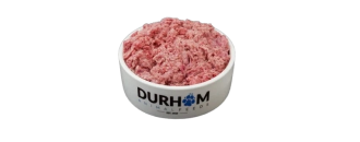 A white bowl labeled Durham filled with finely ground raw meat, on a plain white background.