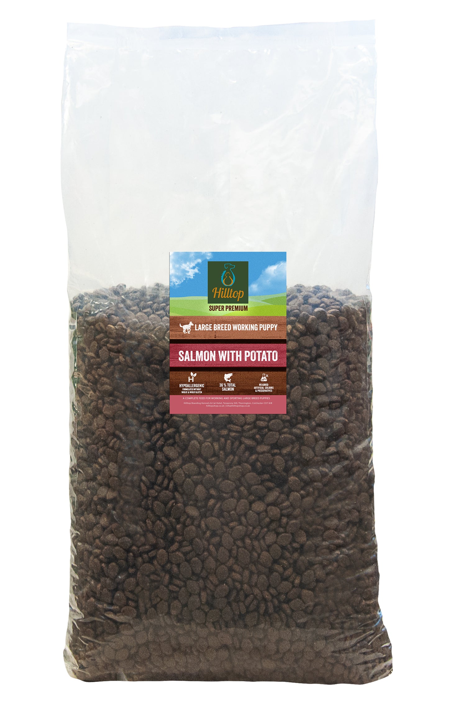 A large clear bag of Hilltop Pet Food Super Premium Puppy Large Breed Salmon with Potato dog food.