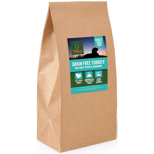 A brown paper bag of Hilltop Pet Food Grain Free Adult Dog Food Light - Turkey, Sweet Potato & Cranberry.