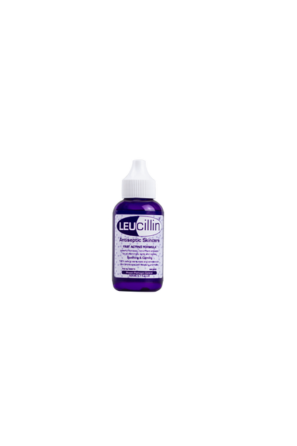 A small purple bottle of Hilltop Pet Food Leucillin Animal Antiseptic Skincare with a white cap, safe for all pets.