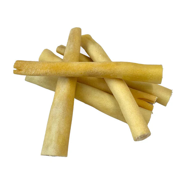 Five Hilltop Pet Food Beef Tail sticks stacked together, isolated on a white background.