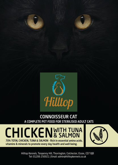 A black cat with yellow eyes peers over a label for Hilltop Connoisseur Cat Food Sterilised Adult - Chicken, Tuna & Salmon.
