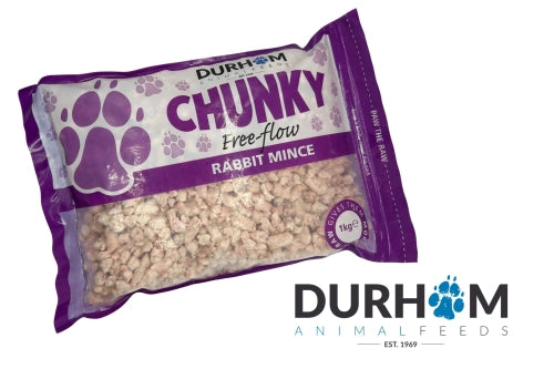A 1kg bag of Hilltop Pet Food Durham Chunky Free Flow Rabbit Mince for pets, in paw print packaging.