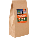 Brown paper bag with a colorful label showing a dog silhouette and icons, likely packaging for dog food.