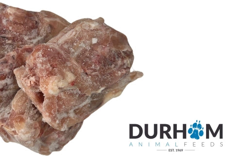 Four pieces of Durham (DAF): Chicken Carcase by Hilltop Pet Food beside the brand logo on a white background.