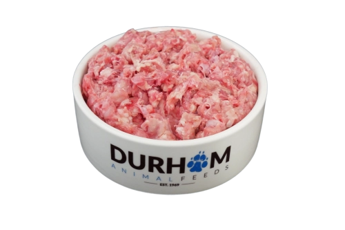 A white bowl labeled Durham Animal Feeds holds Hilltop Pet Foods Turkey Mince 454g on a white background.