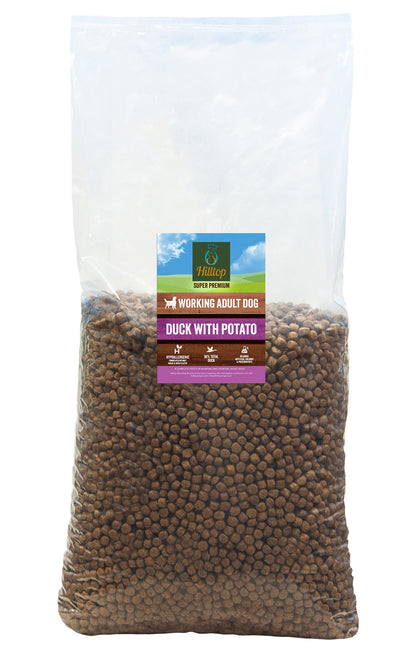 A large clear bag of Hilltop Super Premium Adult Dog Food - Duck & Potato, grain free, for adult working dogs.