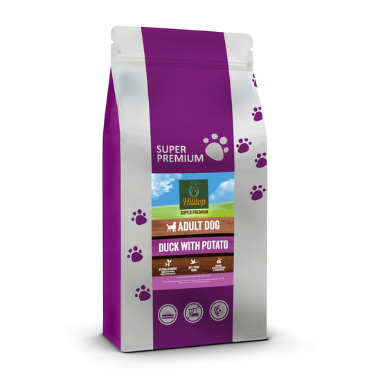 Purple and white bag of Hilltop Pet Food Super Premium Adult Dog Food - Duck & Potato, with paw prints on the pack.