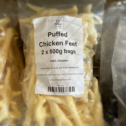 Packaged puffed chicken feet with a label on a clear background