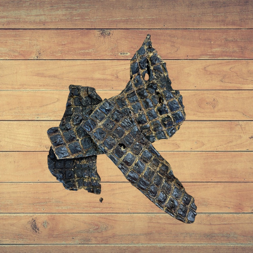 3 pieces of Beef Spleen dog treat stacked on a wooden surface 