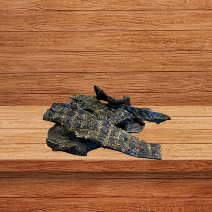 Beef Spleen dog treats stacked on a wooden shelf 
