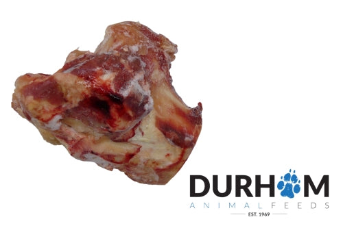 A Hilltop Pet Food Beef Knuckle Bone (Durham DAF) with real meat beside the logo on a white background.