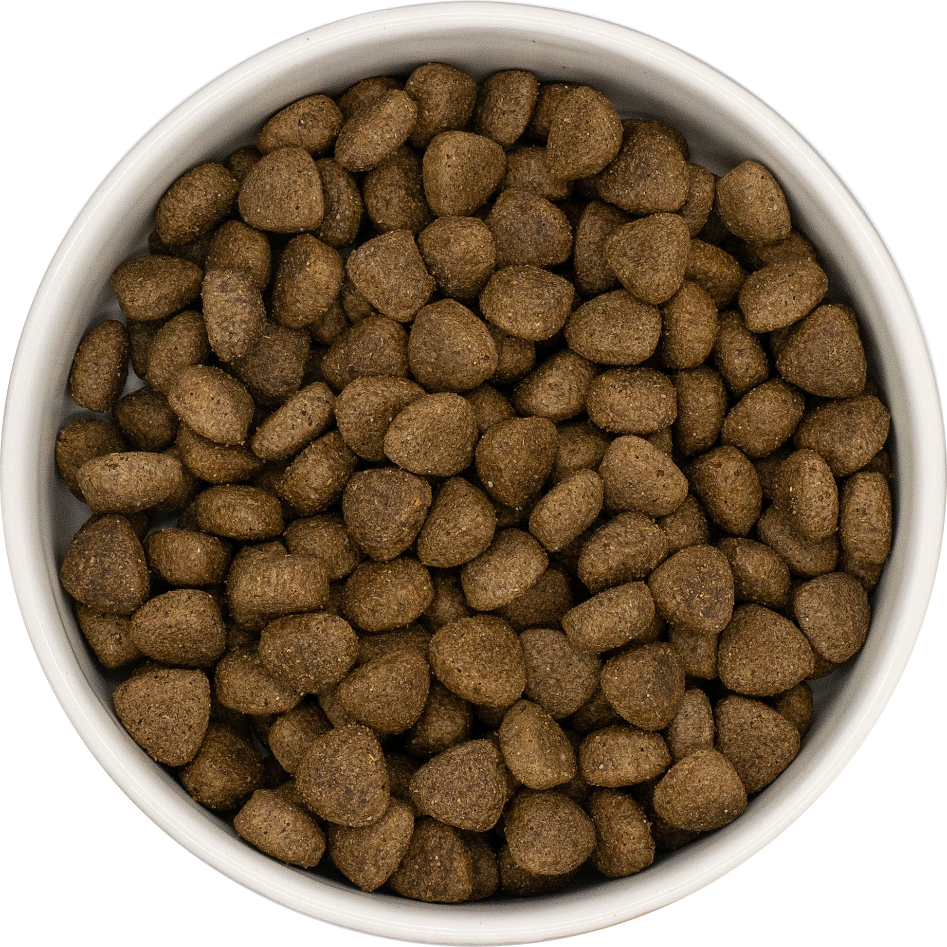 A white bowl filled with Hilltop Super Premium Adult Dog Food - Lamb & Rice by Hilltop Pet Food, viewed from above.