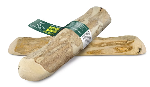 Two goodWood Coffee Wood Chewable Sticks for dogs by Hilltop Pet Food, one with a green & yellow label.