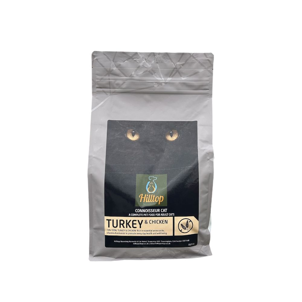 Hilltop Connoisseur Cat Food Adult, Turkey & Chicken by Hilltop Pet Food, features a cat eyes design on the bag.