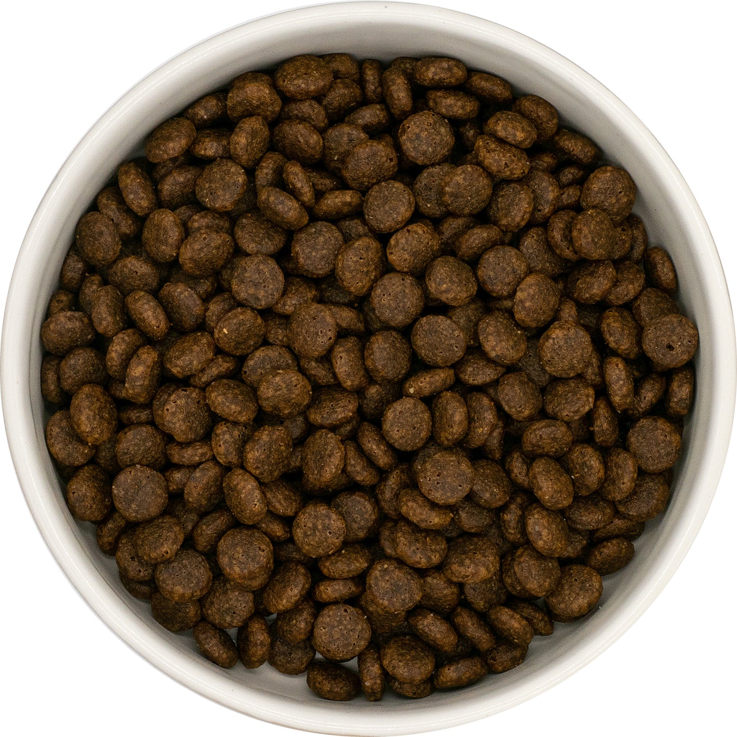 A white bowl of Hilltop Grain Free Adult Cat Food—Fresh Turkey & Sweet Potato kibble, viewed from above.