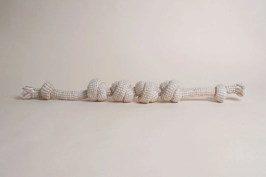 The Hilltop Pet Food Natural Rope Toy - Knotty But Nice Tug, in beige and white, sits on a neutral background.