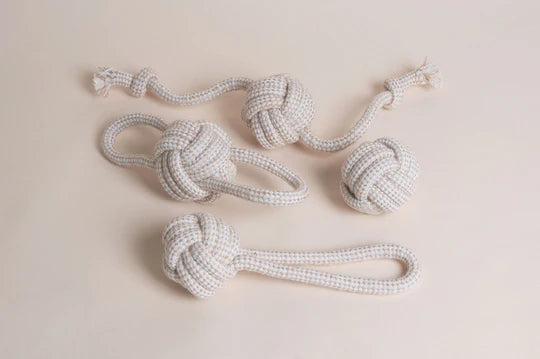 Set of 4 Hilltop Pet Food Rope Toys - Ball For One, eco-friendly with handles, on a light beige surface.
