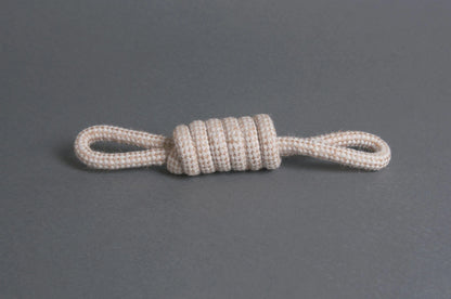 The Hilltop Pet Food Natural Rope Toy - Bow Tie Tug is a white, knotted organic toy with loops at both ends.