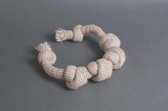 The Hilltop Pet Food Natural Rope Toy - Knotty But Nice Tug is a beige, eco-friendly dog toy with multiple knots.