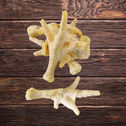 Puffed chicken feet on a wooden surface