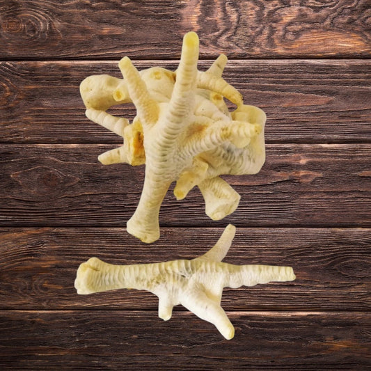 Puffed chicken feet on a wooden surface