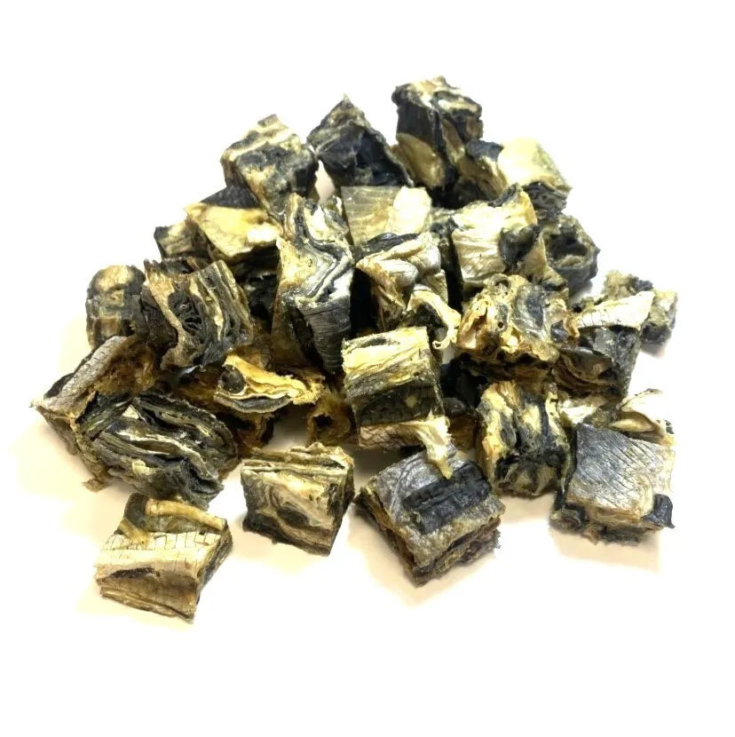 Hilltop Pet Food Fish Skin Cubes (White Fish) grain-free Omega-3 dog treats on a white background.